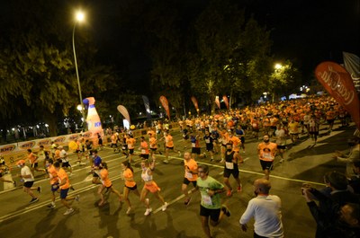 10.000 corredores participan en la  KH-7 Nocturna del Guadalquivir, en la que se imponen Rubén Álvarez y Carmen Gutiérrez Peña